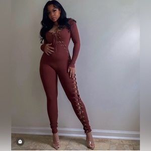 Beautiful Lace up jumpsuit that zips up back